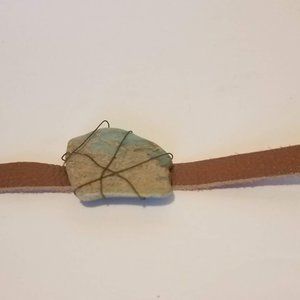 Stone and wire bracelet on leather band